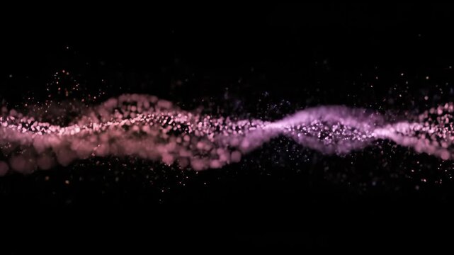 Rose gold glitter particles framing black background for luxury celebration design.