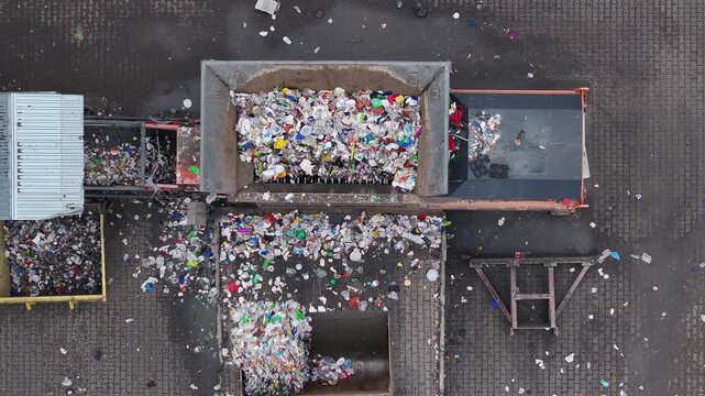 Waste recycling facility processes plastic waste and sorts materials