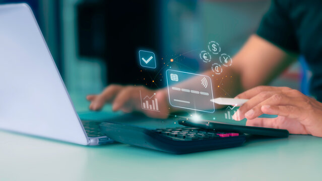 Businessman using smartphone for contactless credit card payment gateway with financial graphics overlay.