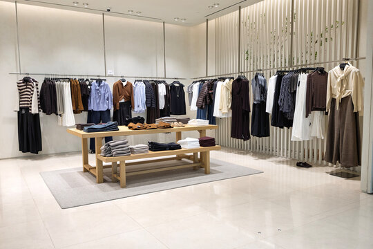 Changi, Singapore - January 21, 2026: An eye-level commercial view of a Massimo Dutti clothing store interior featuring organized fashion collections and premium apparel displays.