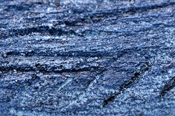 Naklejka premium Close-Up dark vintage plaster background with deep scratches