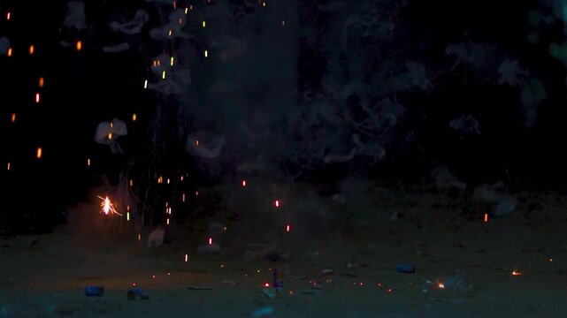 Slow motion shot of firecracker bursting during the Diwali festival in India. Deepavali festival background with copy space. Firecrackers during the Diwali festival celebration in India.