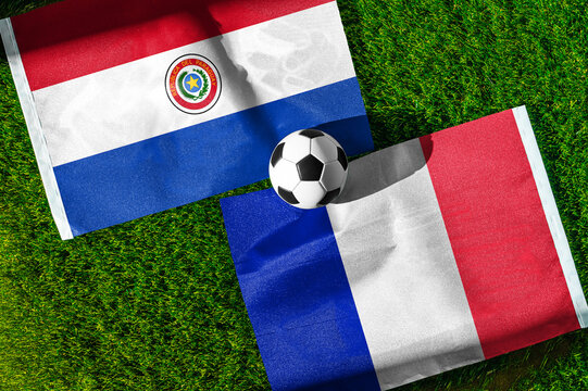 Paraguay vs France, national flags before international football match, football on green grass with stadium in the background, Lincoln Financial Field, Philadelphia, Pennsylvania, USA, July 4, 2026