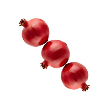Three red pomegranates with glossy skin and short stalks on transparent background