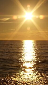 A Serene Sunset Over the Tranquil Ocean, Captivating Rays Glimmering on the Water's Surface, Embracing the Beauty of Nature's Evening Transformation