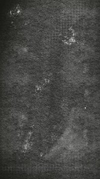 Abstract Vertical black backdrop with grunge, grids, grain noise overlay. Vintage hand drawn motion graphic backdrop with dirty dust particles and free space. Alpha channel