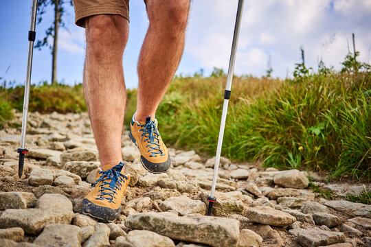 Close-up of man hiking on the trail