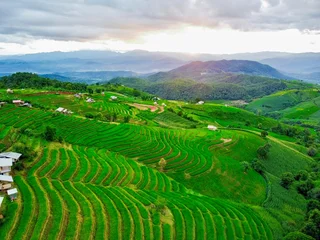 Fotobehang Groen Aerial view of terraced rice fields with mountain landscape at Pa Pong Piang, Chiang Mai, Thailand  © Apichat123