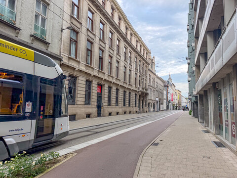 Modern De Lijn Tram on Historic Street in Antwerpen, Belgi&euml; &mdash; Sustainable Urban Public Transport