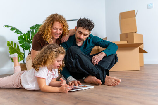 Family moving to new home reviewing old memories