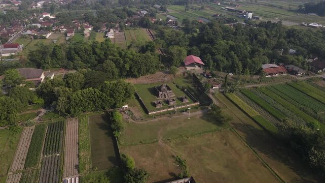 An aerial view of Kedulan Temple, a Hindu archaeological site in Sleman, Yogyakarta. The temple was built around the 8th and 9th centuries during the Ancient Mataram Kingdom.