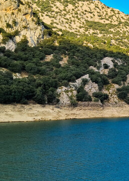 Coast of mountain lake Gorg Blau in Tramuntana Mountains on Mallorca.