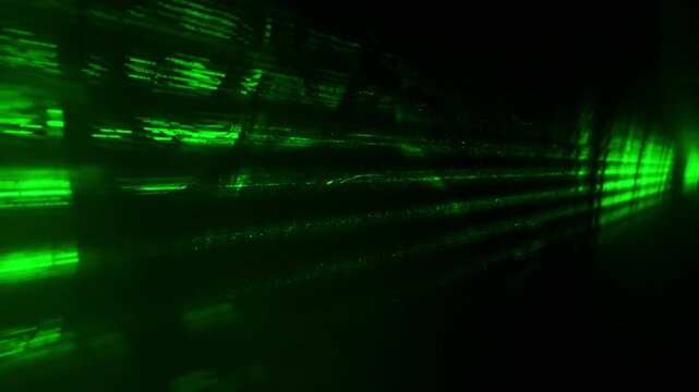 Emerald laser beams slice through darkness. Lines of light pulse in synchronized rhythm. Futuristic energy moves forward with purpose. Ideal for sci-fi, tech, or digital concept visuals