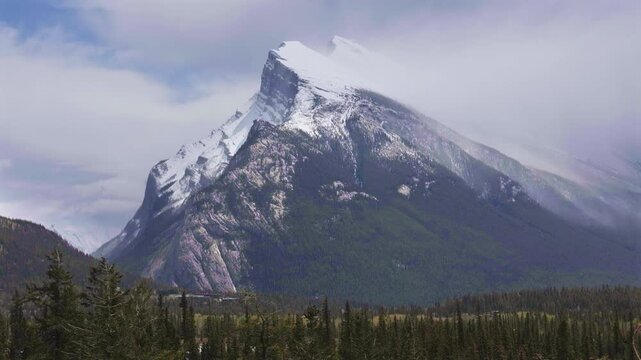 Clouds moving around Mount Rundle in Banff