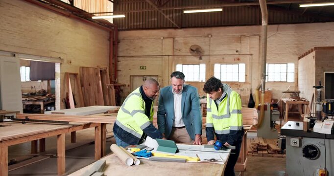 Architecture, team or manager in factory with blueprint, building plan or feedback on furniture project. Discussion, men or contractor with paper, operation report or director evaluation in woodwork