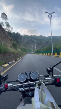 POV Motorcycle Ride on Murree Expressway, Pakistan | Scenic Mountain Highway | Vertical HD Video. Perfect for travel, transportation, road trip, tourism, adventure, and infrastructure projects.