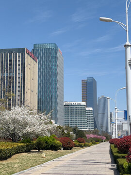 Qingdao, Shandong, China - May 9, 2026: Modern Sheraton hotel and contemporary business district 