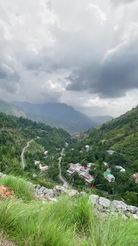Cinematic Reveal of a Scenic Mountain Valley from a Winding Road in Abbottabad, Khyber Pakhtunkhwa, Pakistan | Vertical Video