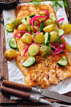 Baked salmon fillet, new potatoes, pickled onion