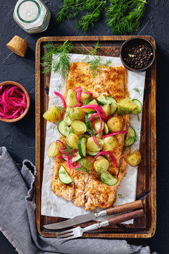 Baked salmon fillet, new potatoes, pickled onion