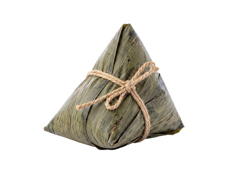 Traditional Chinese zongzi, a savory sticky rice dumpling intricately wrapped in fresh bamboo leaves and tied.