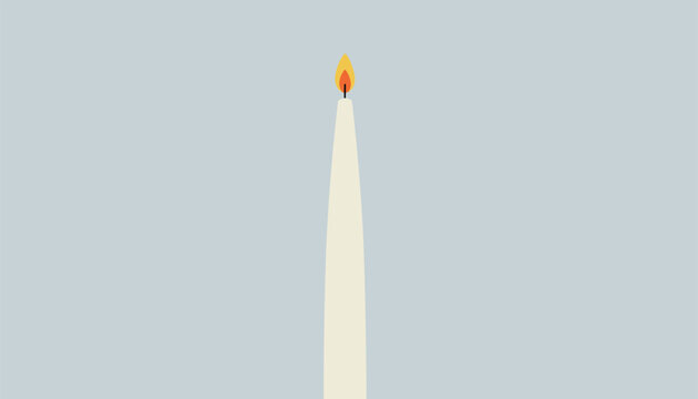 Single elegant tall white taper candle with a burning flame casting a warm glow against a soft light blue grey background.