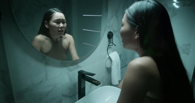 Woman look scream mirror. Psychological concept identity crisis, trauma, mental health struggle, depression, despair. Upset girl feel bad, pain. Self-doubt insecurity. Panic attack. Nervous breakdown.