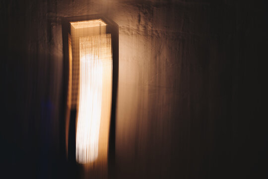Copper & Cadence &mdash; Cinematic abstract of a cozy late-night recording studio workspace, featuring warm ambient light dragging across raw jute textures, instrument geometry, and fluid intentional camera