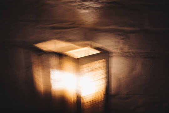 Copper & Cadence &mdash; Cinematic abstract of a cozy late-night recording studio workspace, featuring warm ambient light dragging across raw jute textures, instrument geometry, and fluid intentional camera