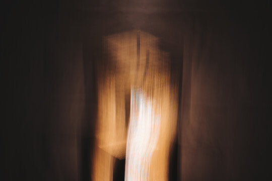 Copper & Cadence &mdash; Cinematic abstract of a cozy late-night recording studio workspace, featuring warm ambient light dragging across raw jute textures, instrument geometry, and fluid intentional camera