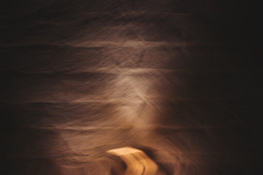 Copper & Cadence &mdash; Cinematic abstract of a cozy late-night recording studio workspace, featuring warm ambient light dragging across raw jute textures, instrument geometry, and fluid intentional camera