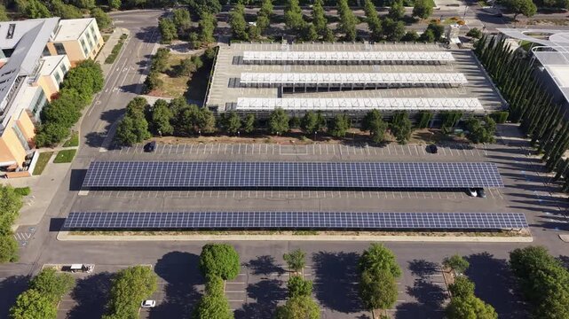 Aerial perspective of an innovative parking structure at the University of California, Davis, featuring extensive solar panels generating clean, renewable energy for the campus and community