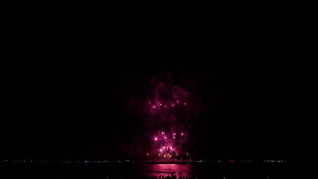Colorful Pyrotechnic Fireworks Display Lighting Up The Night Sky Over The Waterfront In Pattaya Chon Buri Thailand