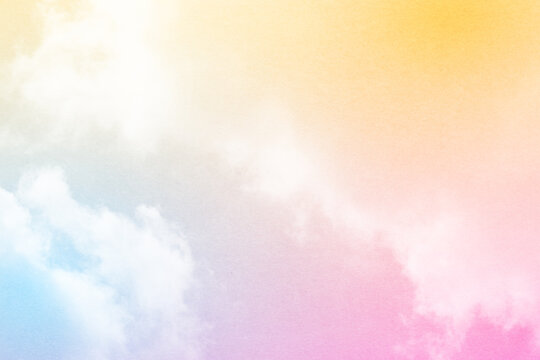fantasy blurred cloudy sky with yellow , blue and pink gradient color and grunge paper texture when zoom 100%,  nature abstract background