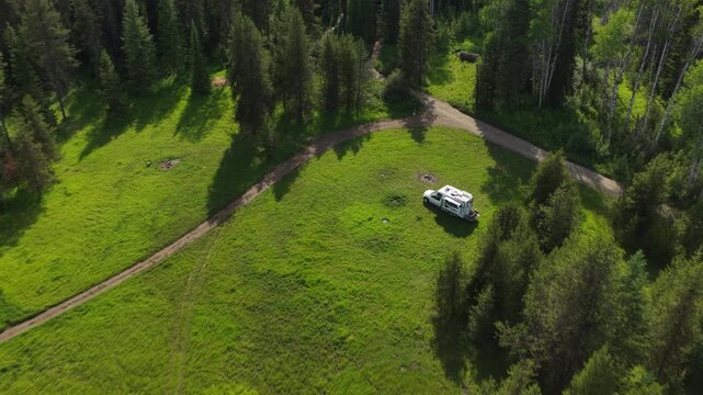 Aerial of RV camping in meadow in Colville National Forest in Washington in summer