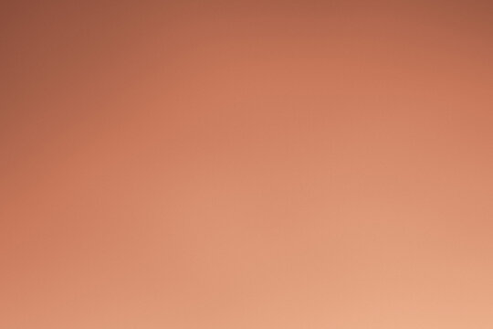 Elegant gold gradient background with smooth golden tones and copy space (rose gold)