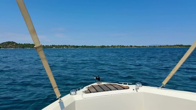 Yacht Cruise with Mediterranean Sea Waves and Mountain Coast in Halkidiki Greece