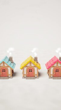 Yellow Blue and Pink Miniature Houses 3D Render