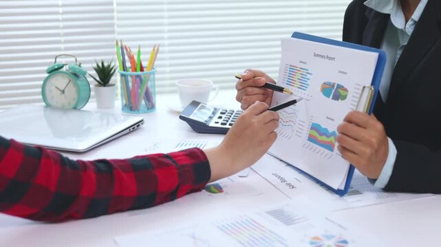 Professional business meeting with financial analysis and digital dashboard. Corporate teamwork, business strategy, graph, chart, investment, innovation, office, 4K.