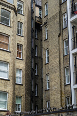 Obraz premium London - 07 12 2022: Chagford Street narrow gap between brick façades