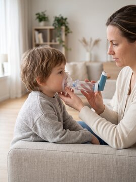 Pediatric Asthma Patient Using Metered Dose Inhaler with Spacer at Home Under Parent Supervision