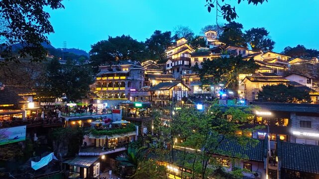 Illuminated Xia Hao Li Neighborhood In Nan'an District Of Chongqing, China - Panning Shot