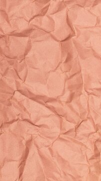 Vertical Abstract Animation of Crumpled Brown Craft Paper Texture Background
