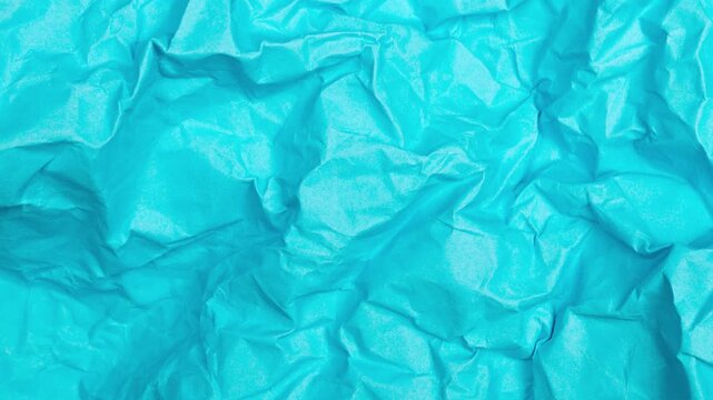 Abstract Animation of Crumpled Vivid Blue Paper Texture Background