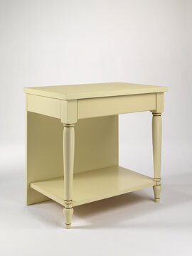 Still life of a classic wooden piece of furniture, on a neutral background
