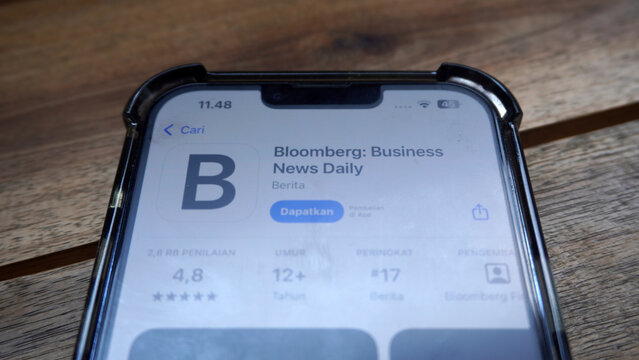 Purwokerto, Indonesia - 17 June 2026: Close-up of an iPhone screen showing the Bloomberg Business News Daily app listing on the App Store.