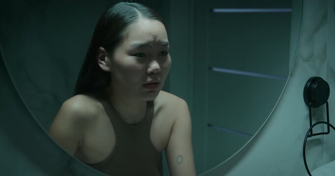Woman look scream mirror. Psychological concept identity crisis, trauma, mental health struggle, depression, despair. Upset girl feel bad, pain. Self-doubt insecurity. Panic attack. Nervous breakdown.
