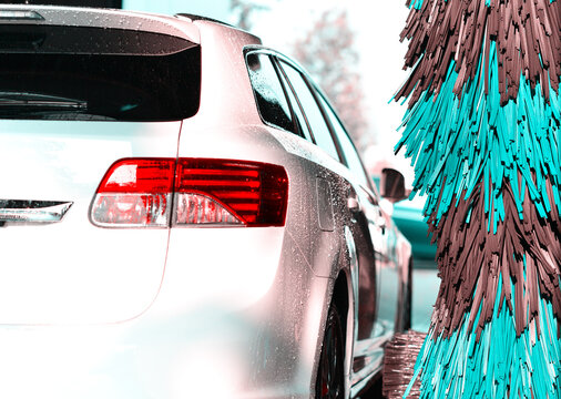 car in a car wash for cleaning a vehicle