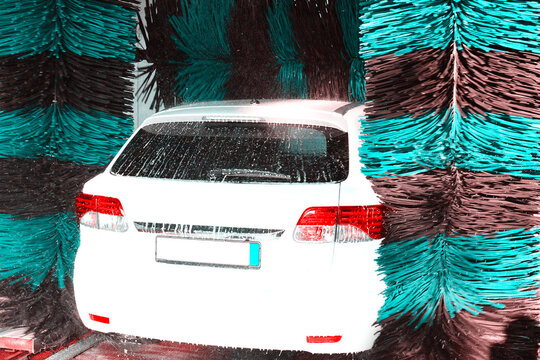 car in a car wash for cleaning a vehicle