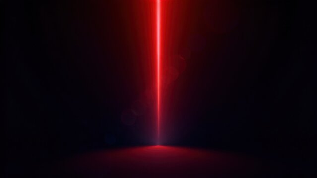 Vertical red light beam on dark background
